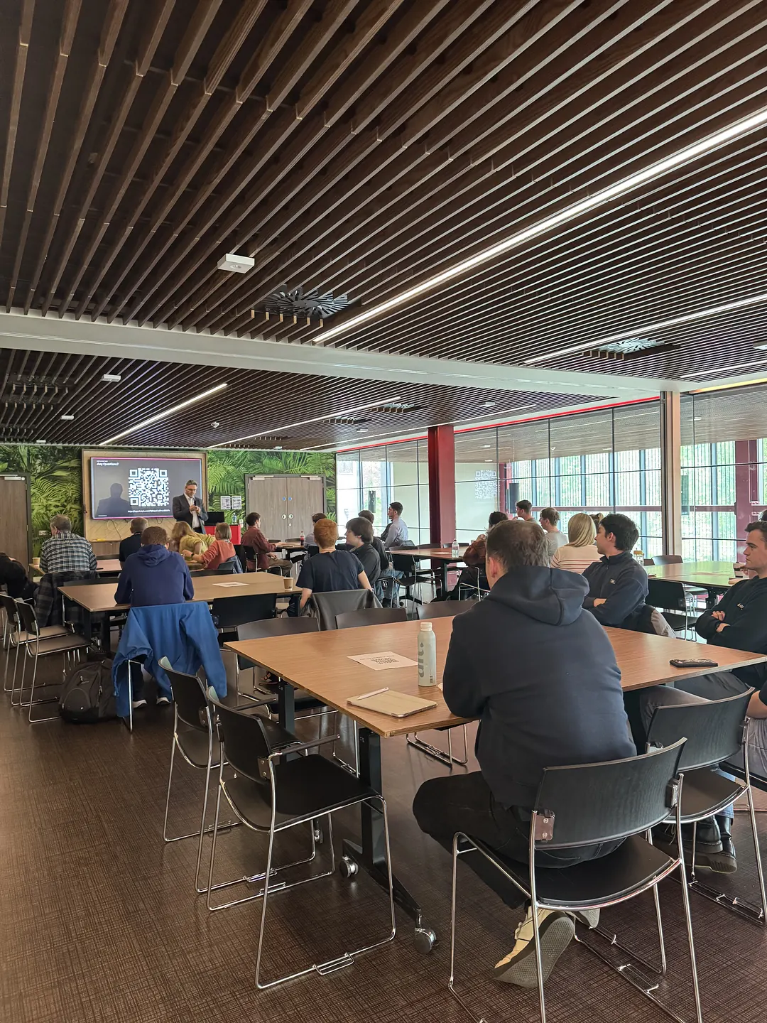 Audience listening intently during the talk at the first FASE NI event